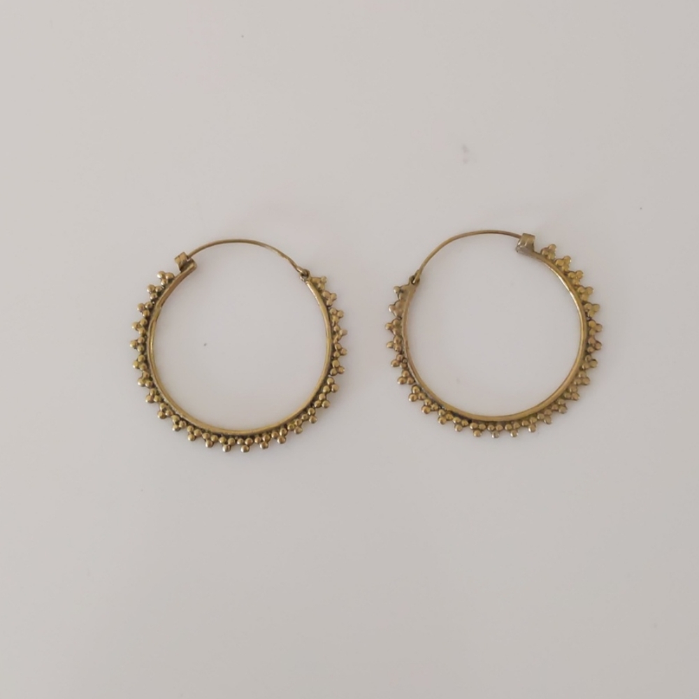 Rustic gold colored hoop earrings